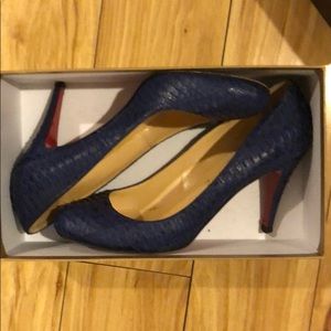 Vibrant blue Louboutins
